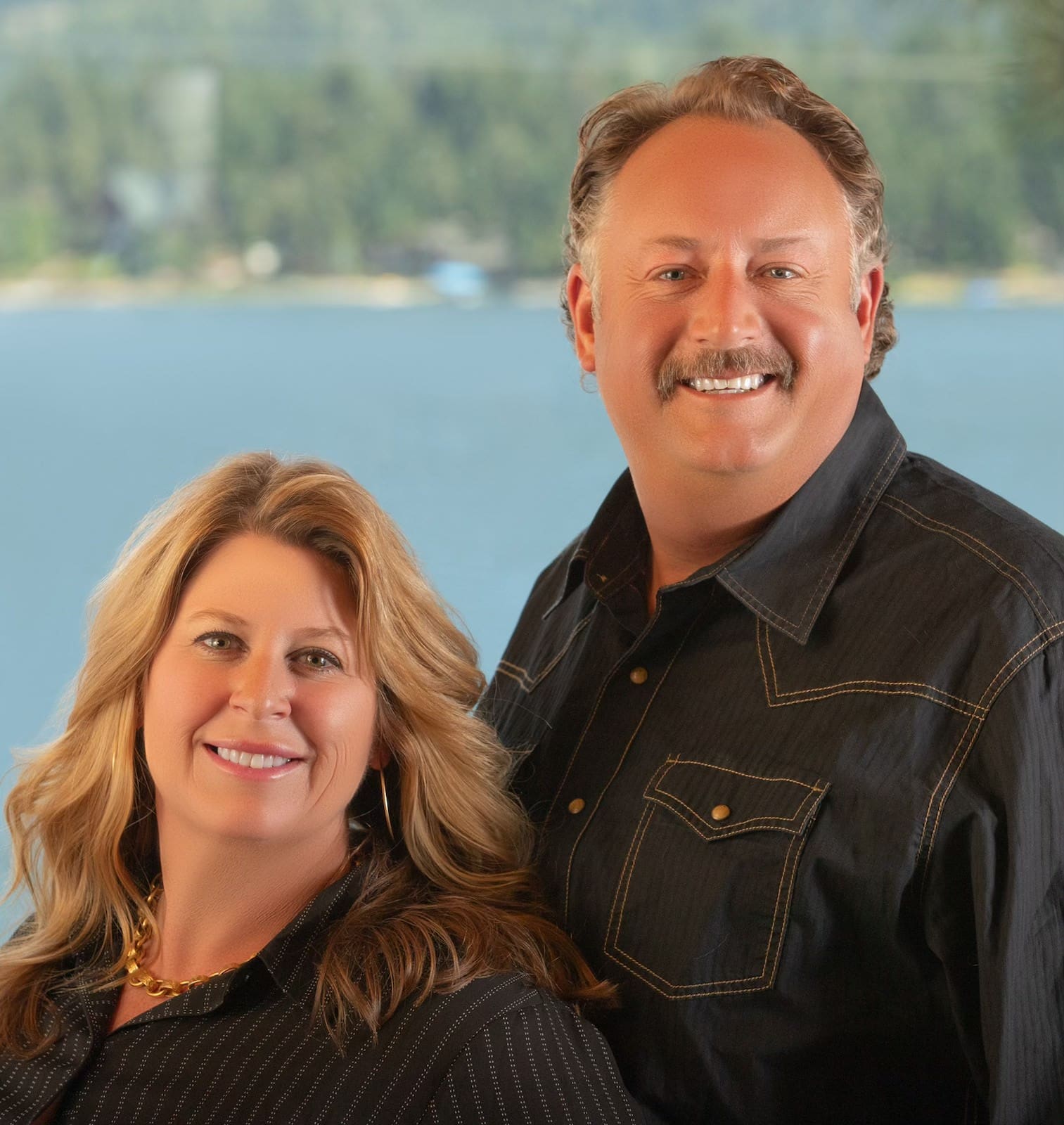 A man and woman standing next to each other.